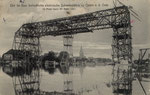 Die im Bau befindliche elektrische Schwebefähre zu Osten a.d. Oste, 35 Meter hoch, 80 Meter breit, gel. 1910
